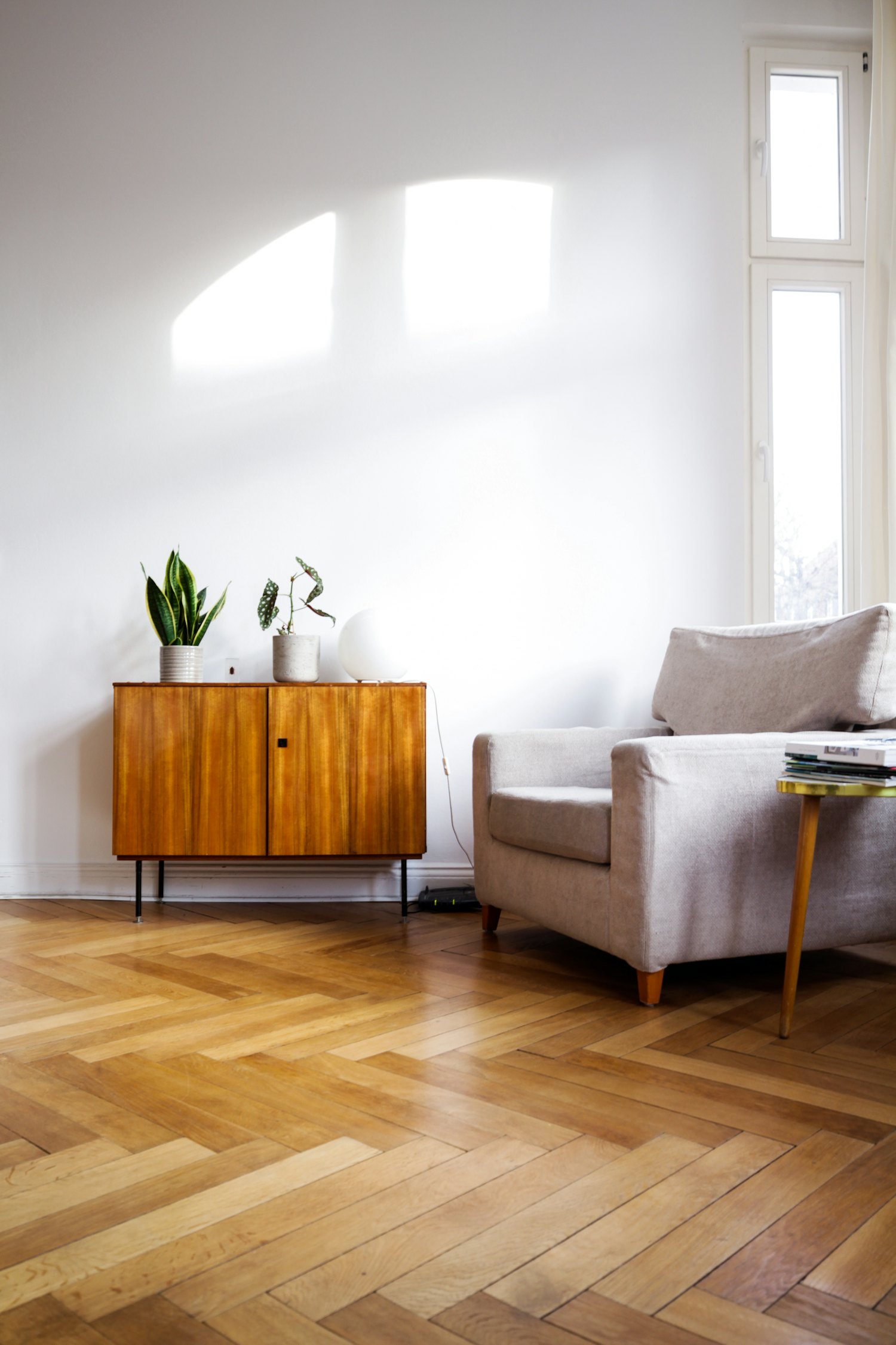 Wood-look laminate flooring in a bright room.