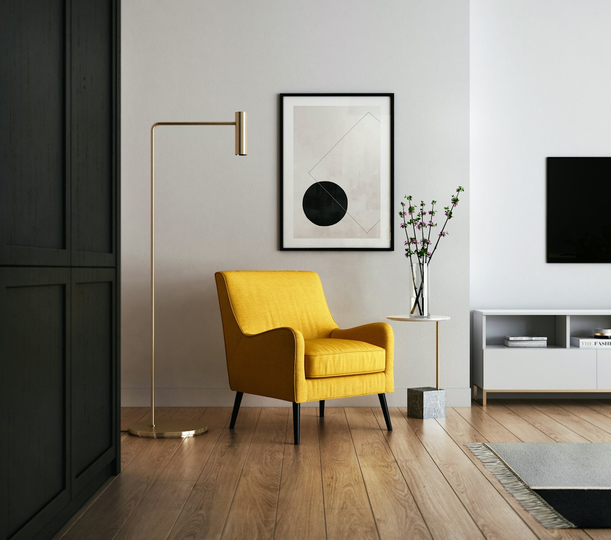 Wide-plank laminate flooring in a bright modern living room.